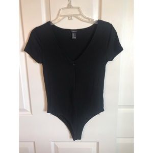 Black zip-front body suit